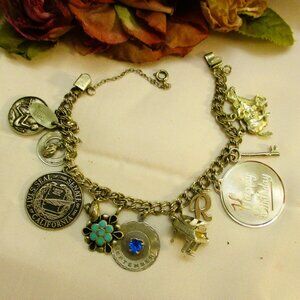 Vintage STERLING SILVER Charm Bracelet: 12 Figural 925 Charms on Curb Chain